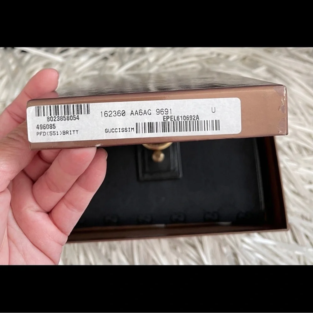 Authentic Gucci Black GG Canvas Wallet with Gold D-Ring - Picture 12 of 15